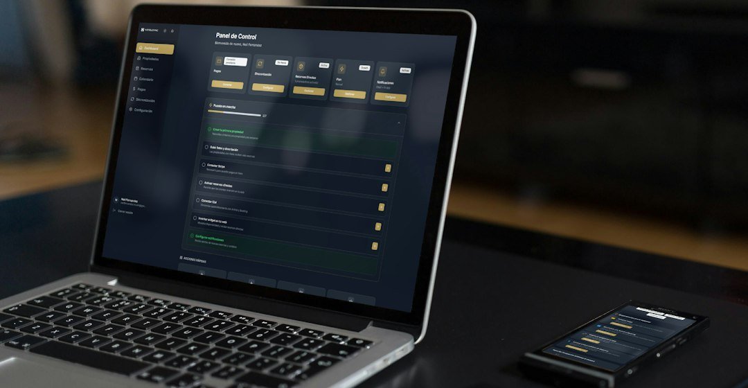 Laptop and phone displaying financial data